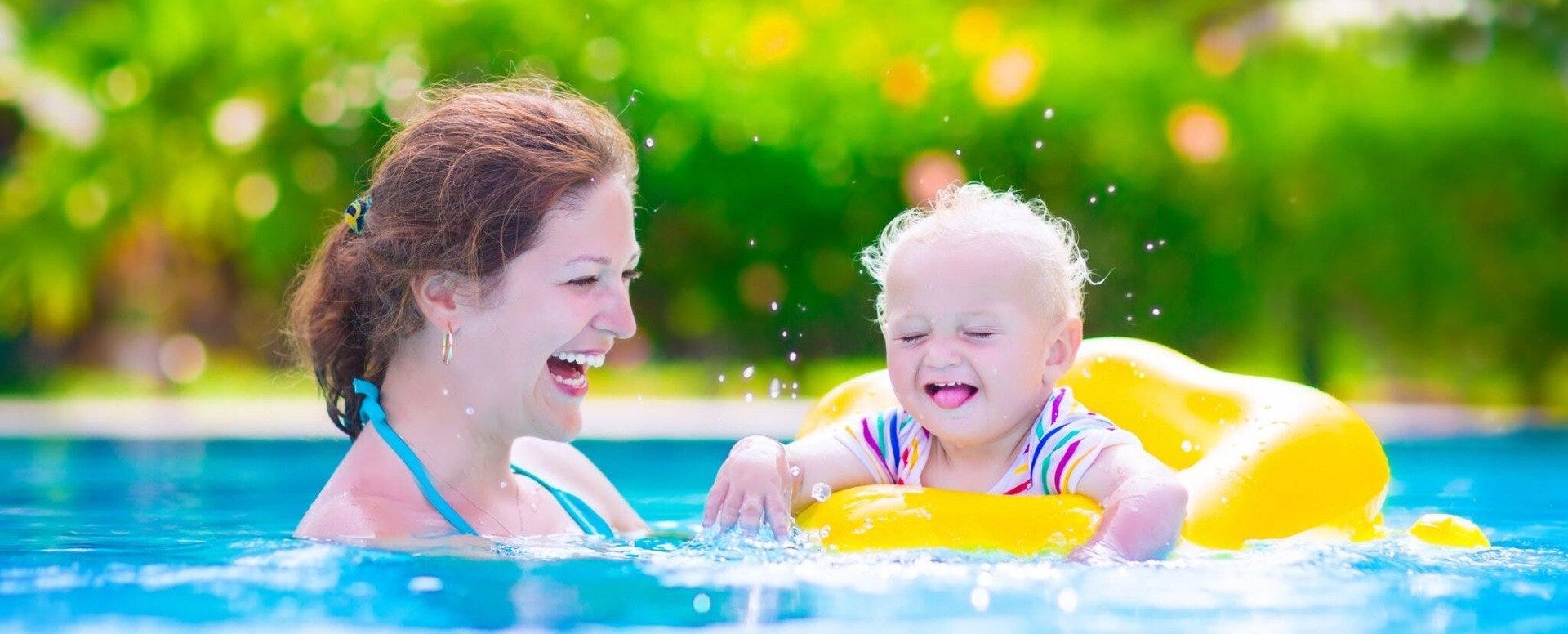 Mother in Pool with Child